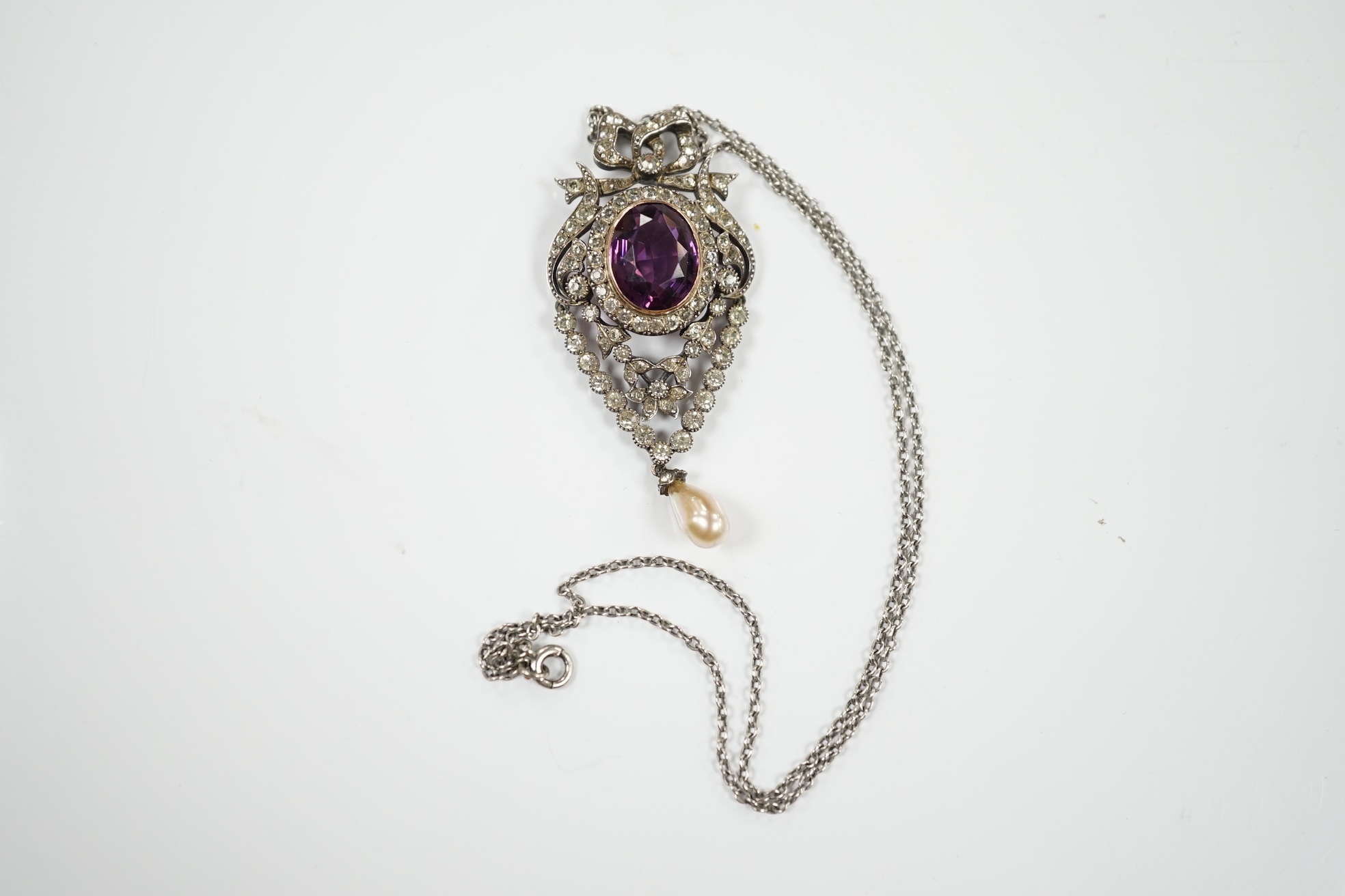 An early to mid 20th century continental 925 white metal, simulated drop pearl and two colour paste set pendant, 58mm, on a white metal chain, 38cm. Condition - good.